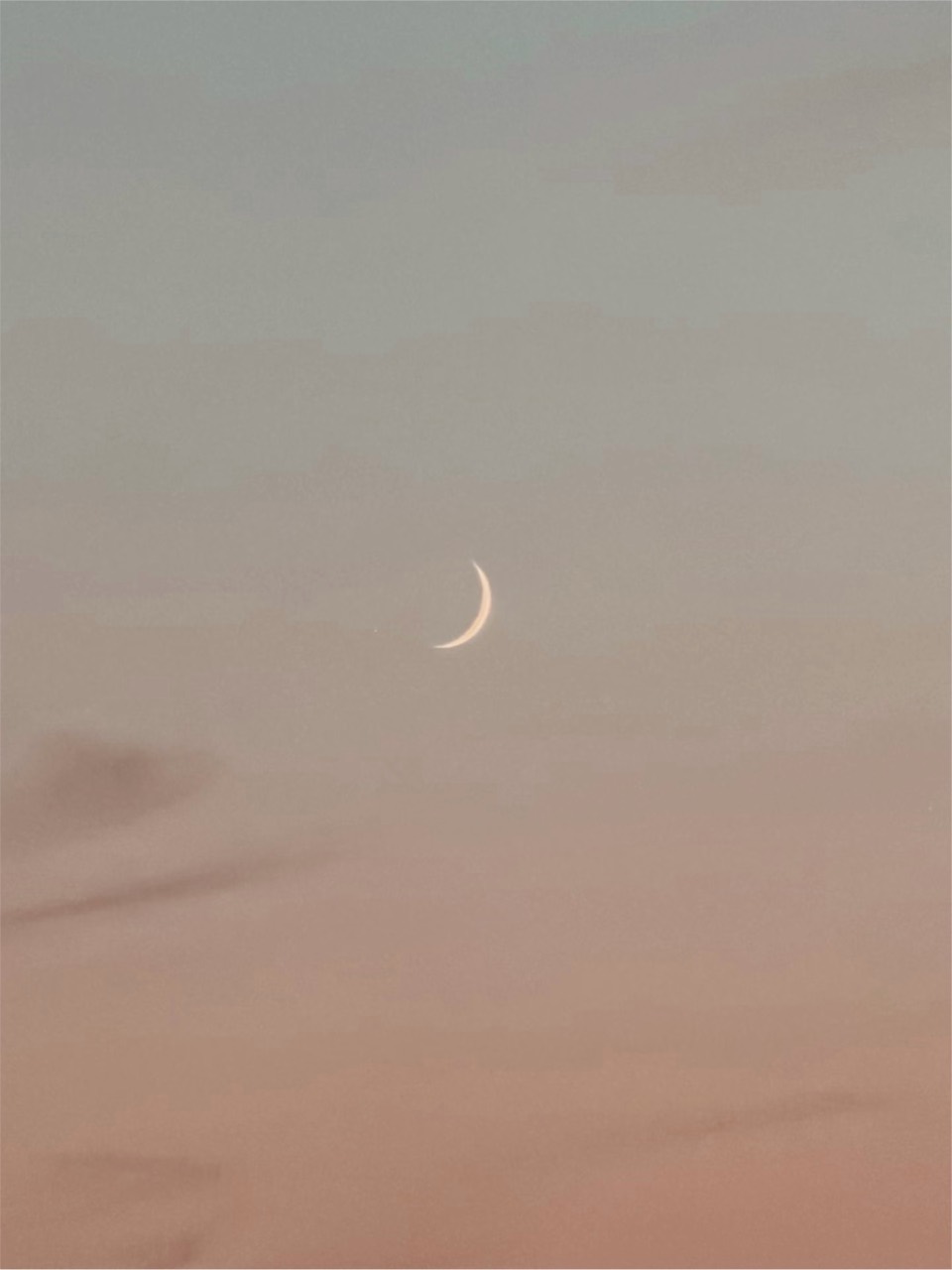 A moon detail cropped from the same photograph, showing the crescent’s edge.